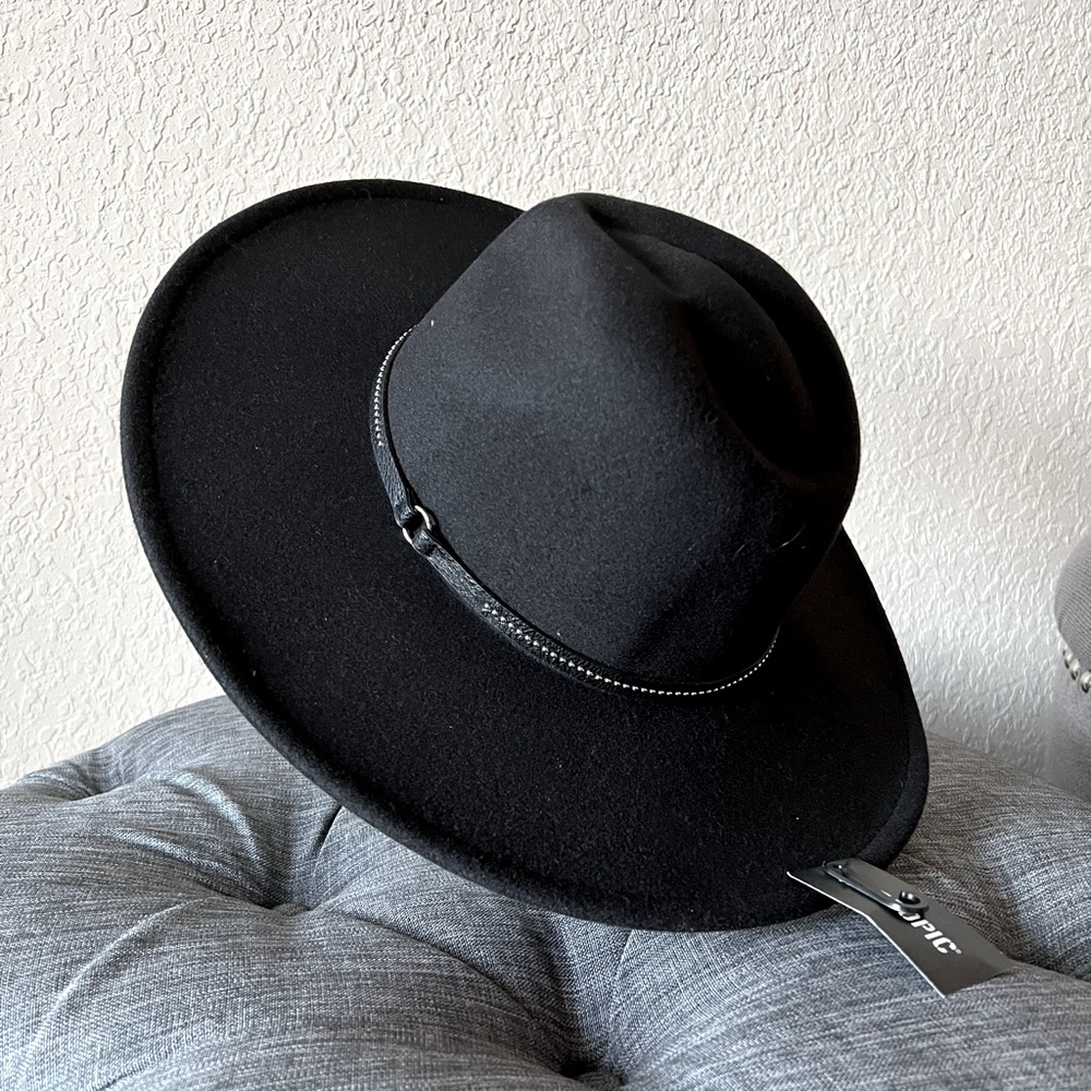 Black, wide/firm brim hat.